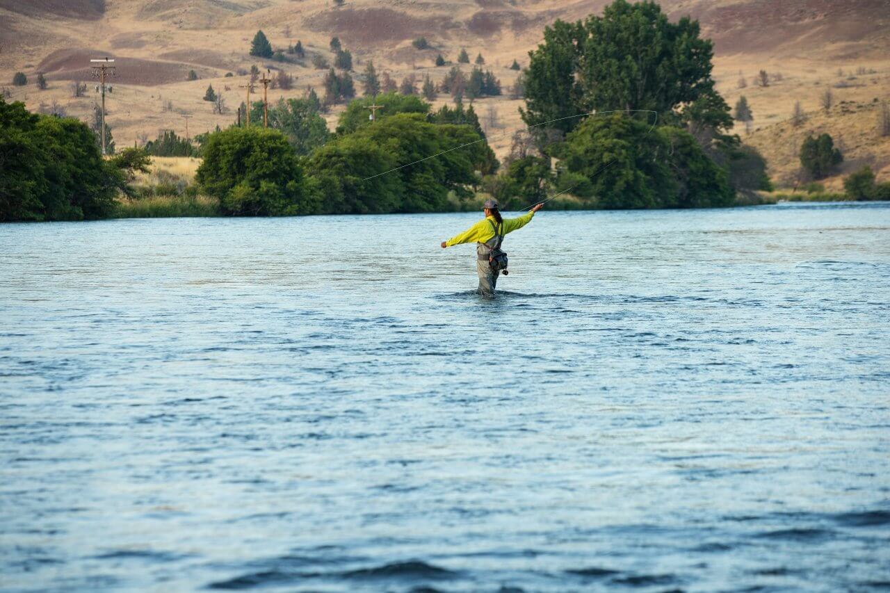 Fly fishing on the Deschutes River near Maupin, Oregon Fly fishing on the Deschutes River near Maupin, Oregon