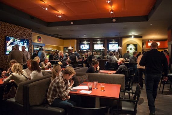 A crowd enjoys food and drink at The Row, Tetherow A crowd enjoys food and drink at The Row, Tetherow